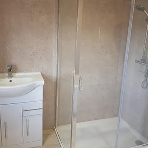 a bathroom with a sink and a shower